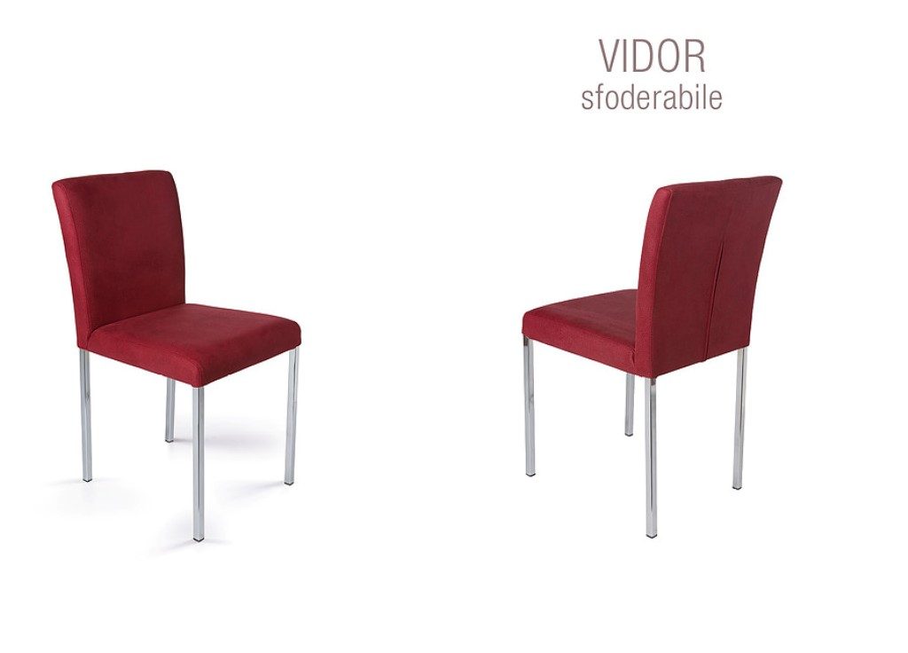 Sedia Vidor con gambe cromate e seduta con rivestimento a scelta tra pelle, ecopelle, econabuk e cuoio.